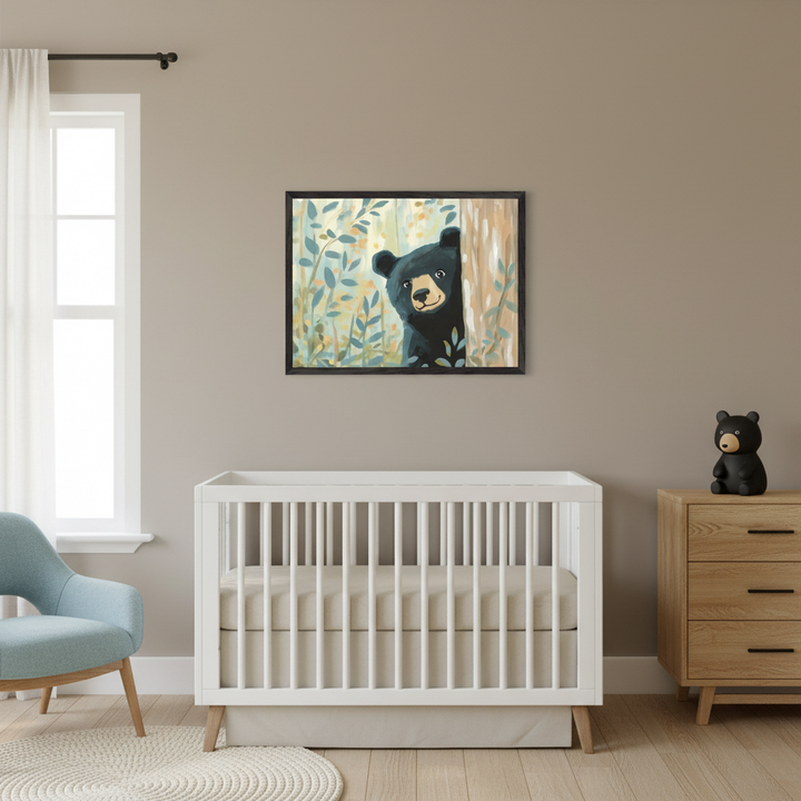Modern nursery with a white crib, light blue armchair, and wooden dresser. A framed painting of a black bear peeking from behind a tree in a forest hangs above the crib.