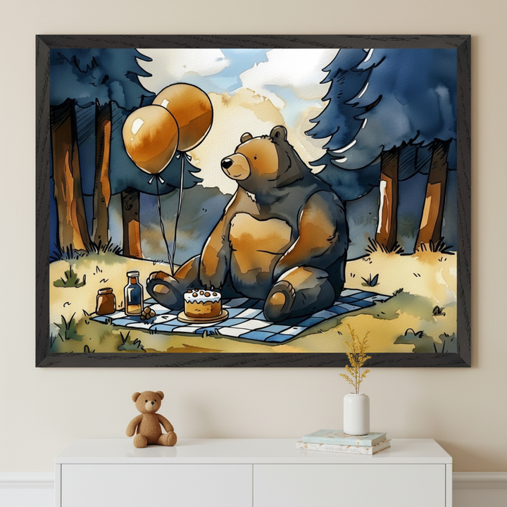 Framed wall art of a cartoon bear having a picnic in the forest, sitting on a checkered blanket with a cake, honey jars, and drinks, while two orange balloons float nearby. The cozy woodland scene, with tall pine trees and soft sunlight, adds a playful and cheerful touch to the room.