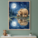 Kid's room with a white dresser against a green wall. A framed watercolor painting of a mother bear and two cubs by a moonlit lake with reflections hangs above the dresser. A teddy bear and succulent are on the dresser.