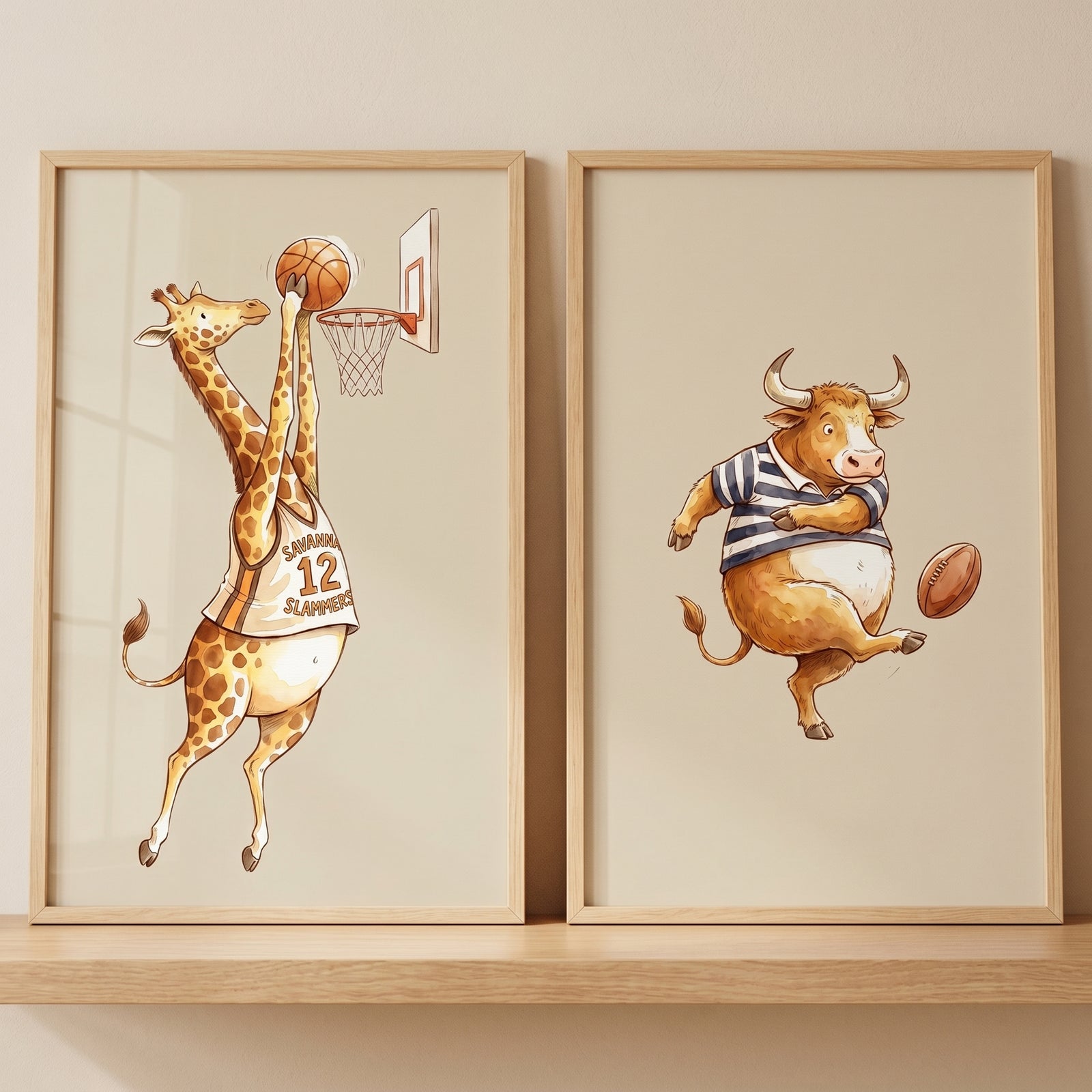 Beige watercolor athletic animals wall art set of 2 featuring a giraffe dunking a basketball and a bull kicking a football.