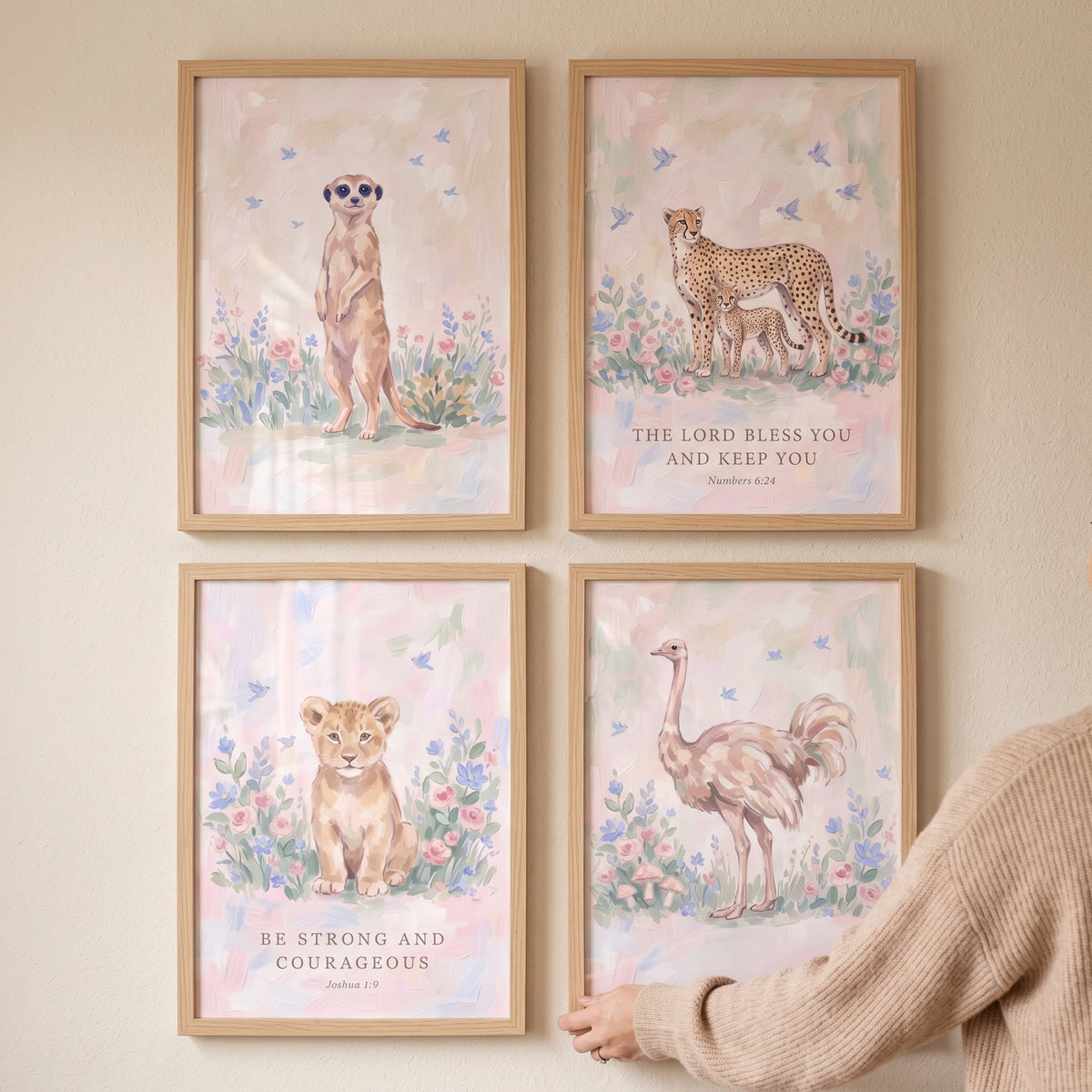 Biblical wildflower savanna animals wall art set of 4 featuring pastel meerkat, cheetah, lion cub, and ostrich illustrations.