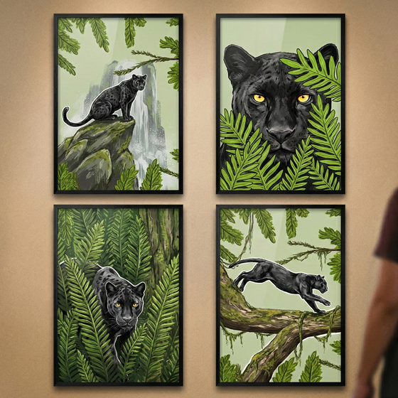 Four black-framed illustrations of a black panther in a lush jungle setting are hung in a 2x2 grid on a wall. The top-left shows the animal on a rocky outcrop near a waterfall. The top-right is a close-up of its face with yellow eyes peeking through ferns. The bottom-left depicts it prowling through dense foliage. The bottom-right captures it leaping across a mossy tree branch. The artwork uses a consistent palette of vibrant greens and deep blacks.
