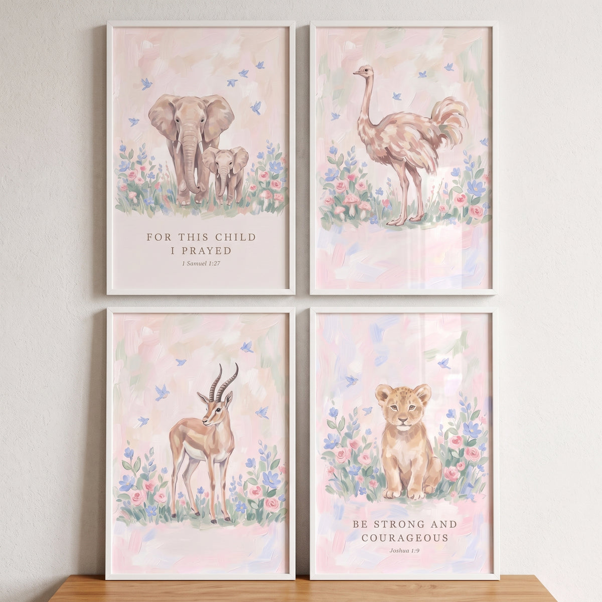 Blooming floral african animals wall art set of 4 with soft pastel elephants, ostrich, gazelle, lion cub and scripture.