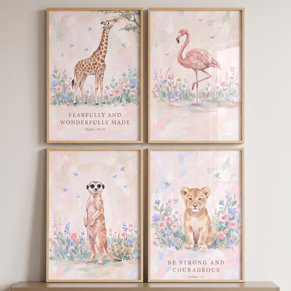 Blossoming petal safari animals wall art set of 4 includes a giraffe, flamingo, meerkat, and lion cub with scripture.
