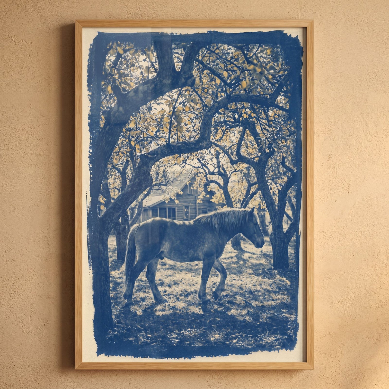 Framed blue orchard horse wall art depicting a horse walking through a grove of trees near a rustic wooden house.