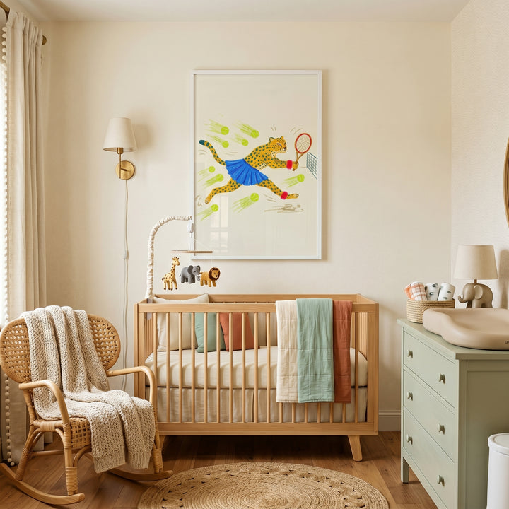 Cozy nursery featuring a wooden crib, wicker rocker, and blue skirt tennis cheetah wall art on the wall.