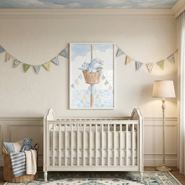 Nursery with a white crib below blue striped scarf dolphin wall art, accented by bunting flags and a floor lamp.