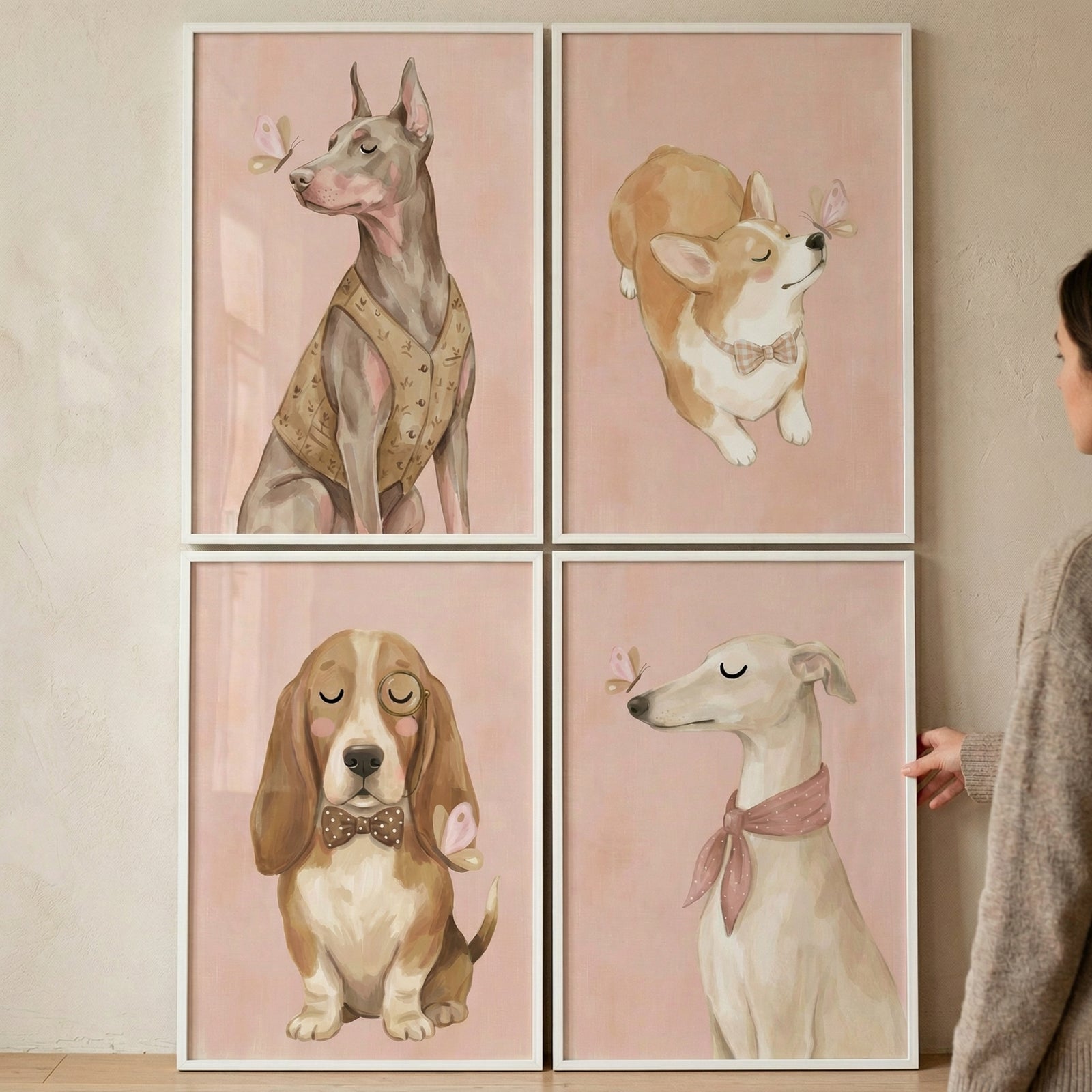 A set of four framed whimsical illustrations featuring different dog breeds, displayed in a 2x2 grid on a neutral-toned interior wall. 

The top-left illustration shows a sleek Doberman in a tan patterned vest, its eyes closed peacefully as a small butterfly rests on its nose. The top-right depicts a fluffy Corgi wearing a light-colored bow tie, tilting its head upward toward a delicate butterfly.