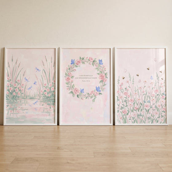 blush pink nature garden wall art set of 3 with dragonflies, a floral wreath, and bees in a wildflower meadow.