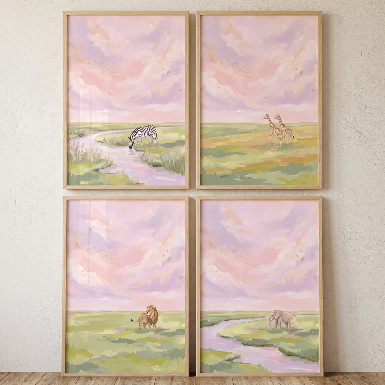 Blush pink savanna animal wall art set of 4 featuring a zebra, giraffes, a lion, and an elephant in soft pastel landscapes.