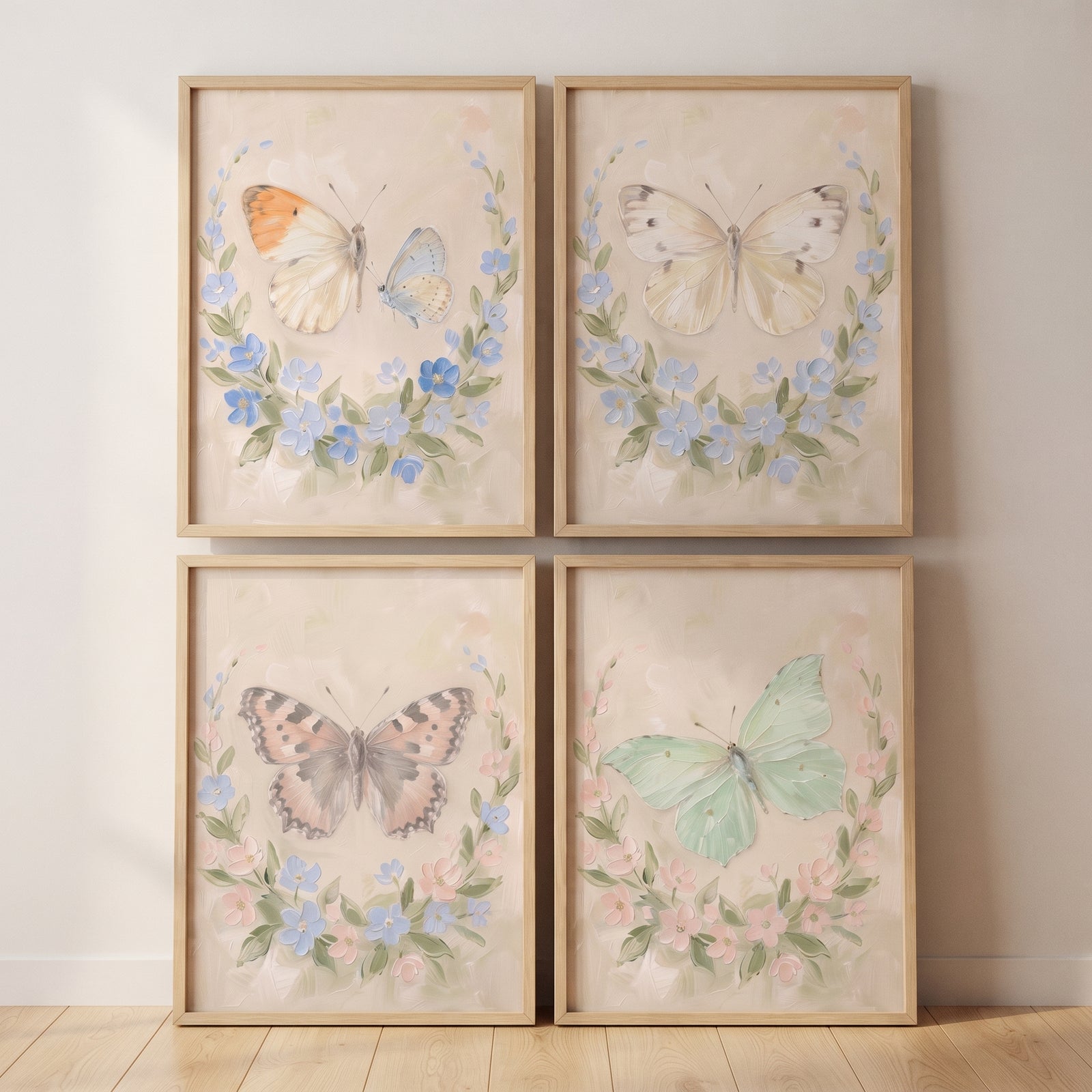 Botanical garland pastel butterfly wall art set of 4 features winged insects inside soft floral wreaths in wood frames.
