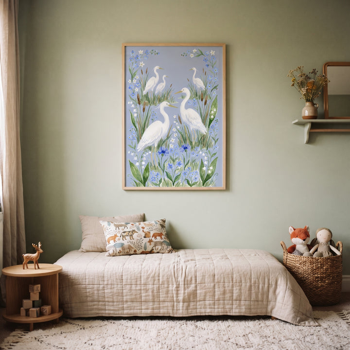 Botanical marsh white heron bird wall art hangs in a serene nursery above a beige bed with animal pillows and wooden toys.