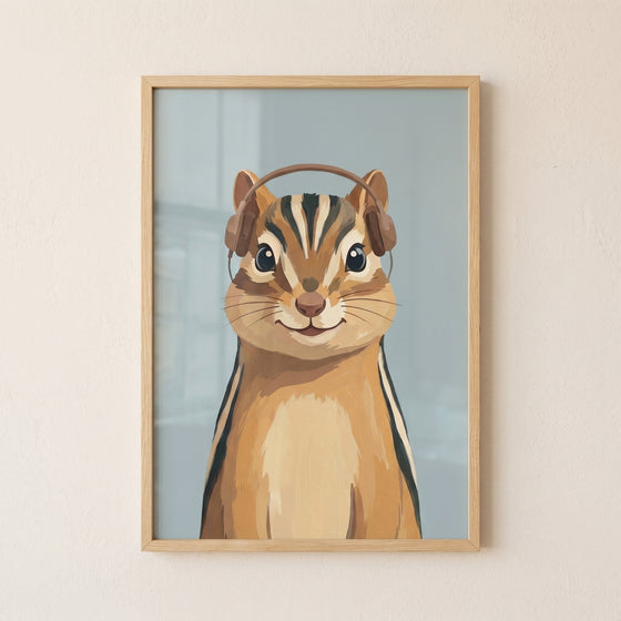 Framed brown headphone chipmunk wall art of a cute smiling chipmunk on a light blue background.