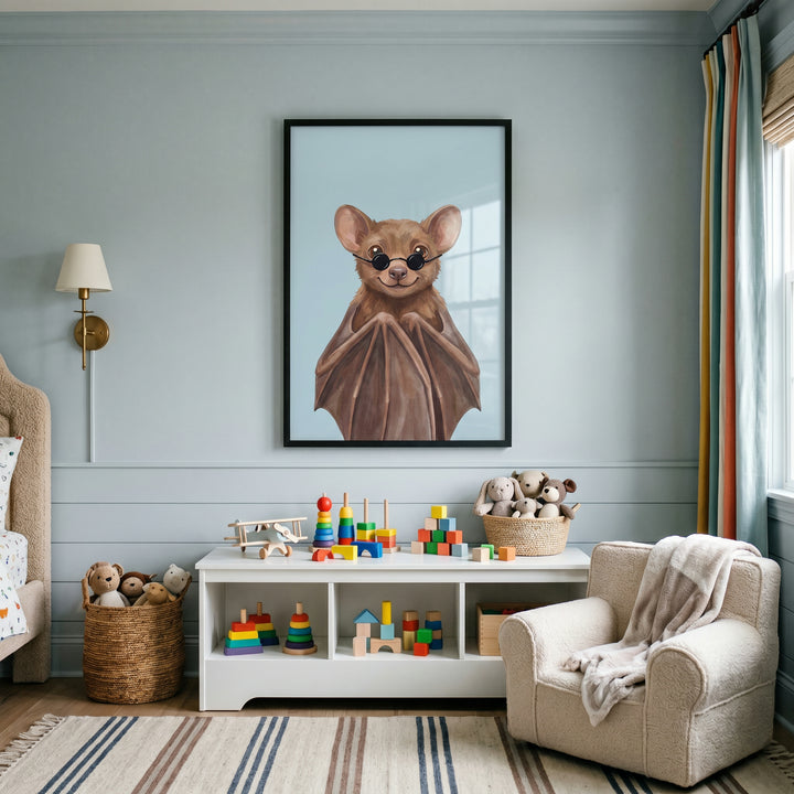 Bedroom with brown round sunglasses bat wall art over a white toy shelf and a small beige armchair on a striped rug.