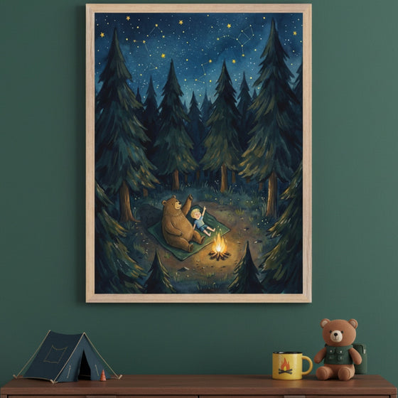 Kid's bedroom with a dark green wall. A framed watercolor painting of a bear and child stargazing by a campfire in a forest hangs centered above a wooden dresser, which holds a miniature tent, yellow mug, and teddy bear.