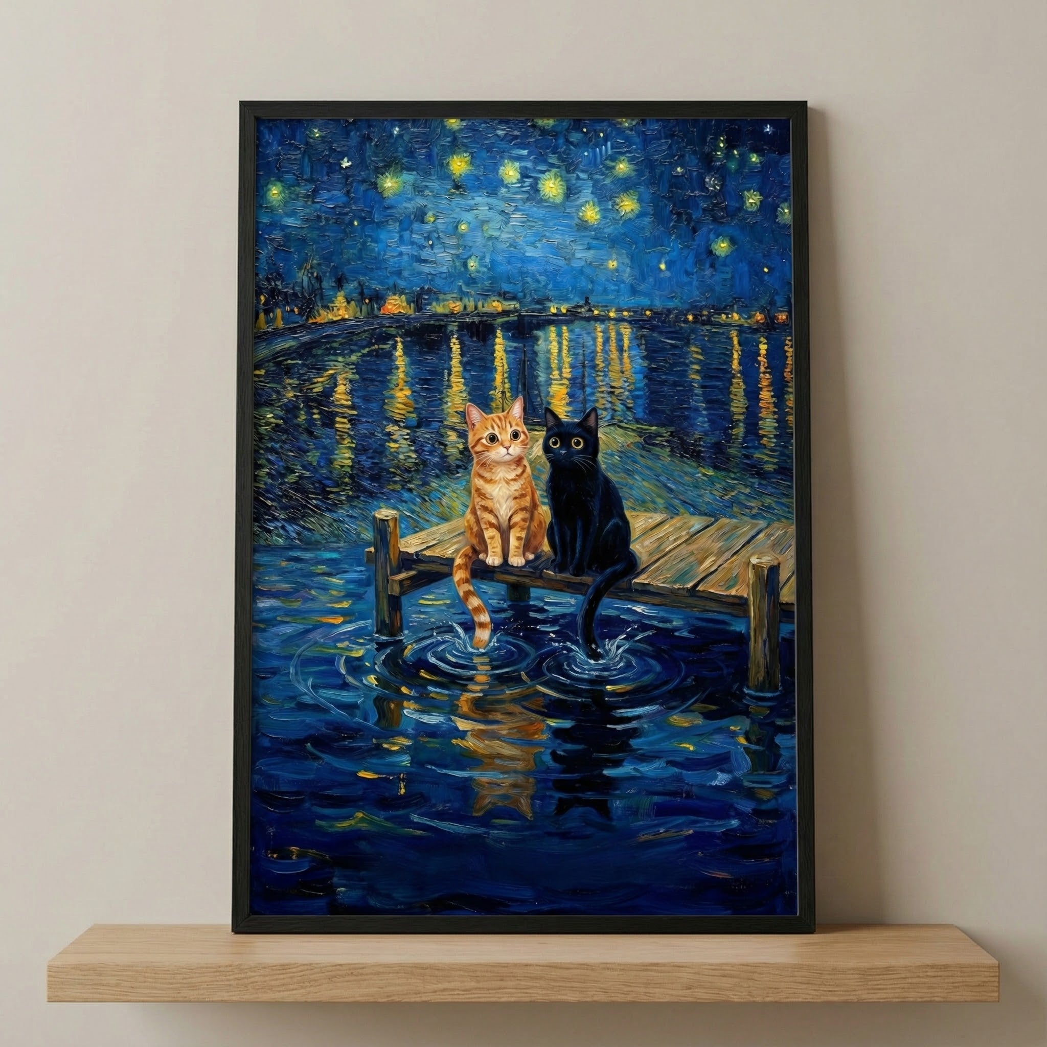 Framed painting of an orange tabby cat and a black cat sitting side by side at the end of a wooden dock, looking out over a shimmering lake under a star-filled night sky. The scene is painted in a Van Gogh-inspired style with swirling brushstrokes and glowing reflections.