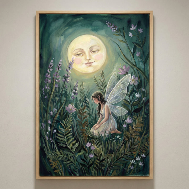 A vertical, framed piece of art depicting a whimsical night garden. In the upper center, a large, full moon with a serene human face looks down with a gentle smile. Below, a small figure with delicate, translucent wings and long dark hair sits among lush foliage, including tall stalks of purple lavender, green ferns, and small white blossoms. The entire scene is bathed in a soft, golden glow from the moon against a dark, atmospheric background.