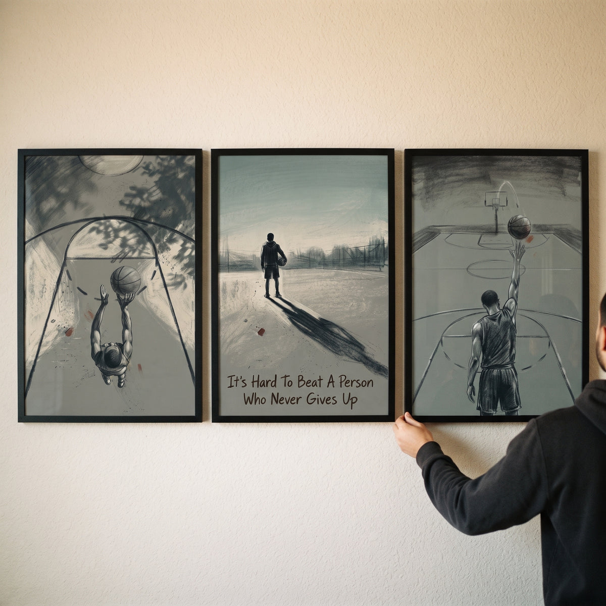 Hand hanging charcoal basketball player sports wall art set of 3 prints featuring court scenes and motivational text.