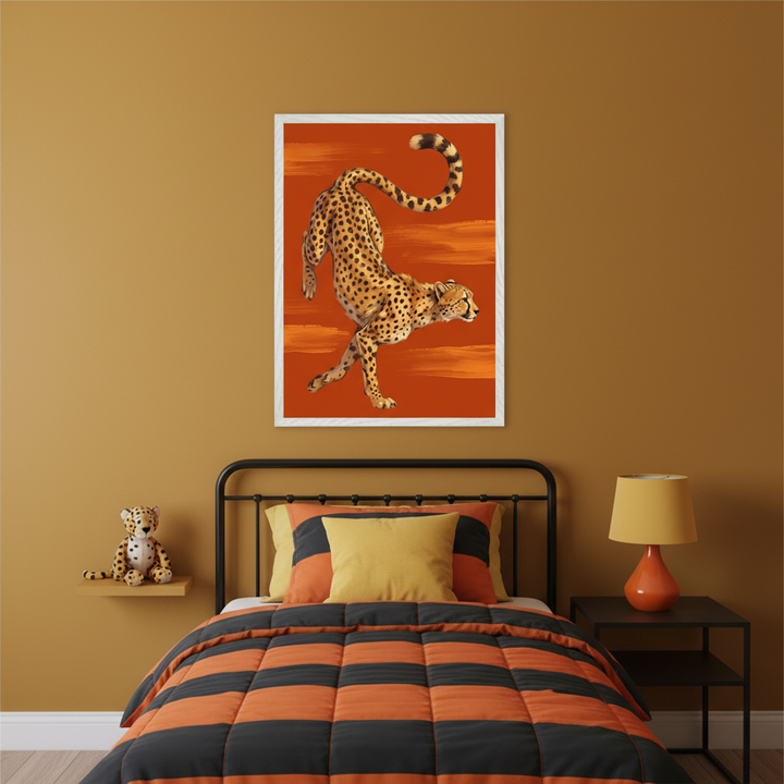 Kid's bedroom with a black metal bed and orange and black striped bedding. A large framed print of a cheetah in motion on an orange brushstroke background hangs centered above the bed. A cheetah plushie sits on a shelf to the left.
