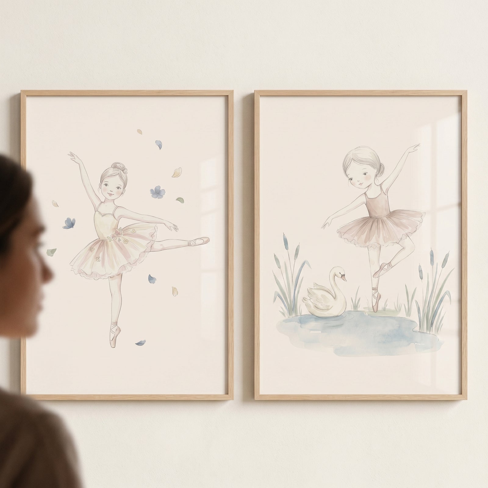 Chic neutral watercolor ballerina wall art set of 2 featuring young dancers with a swan and petals.