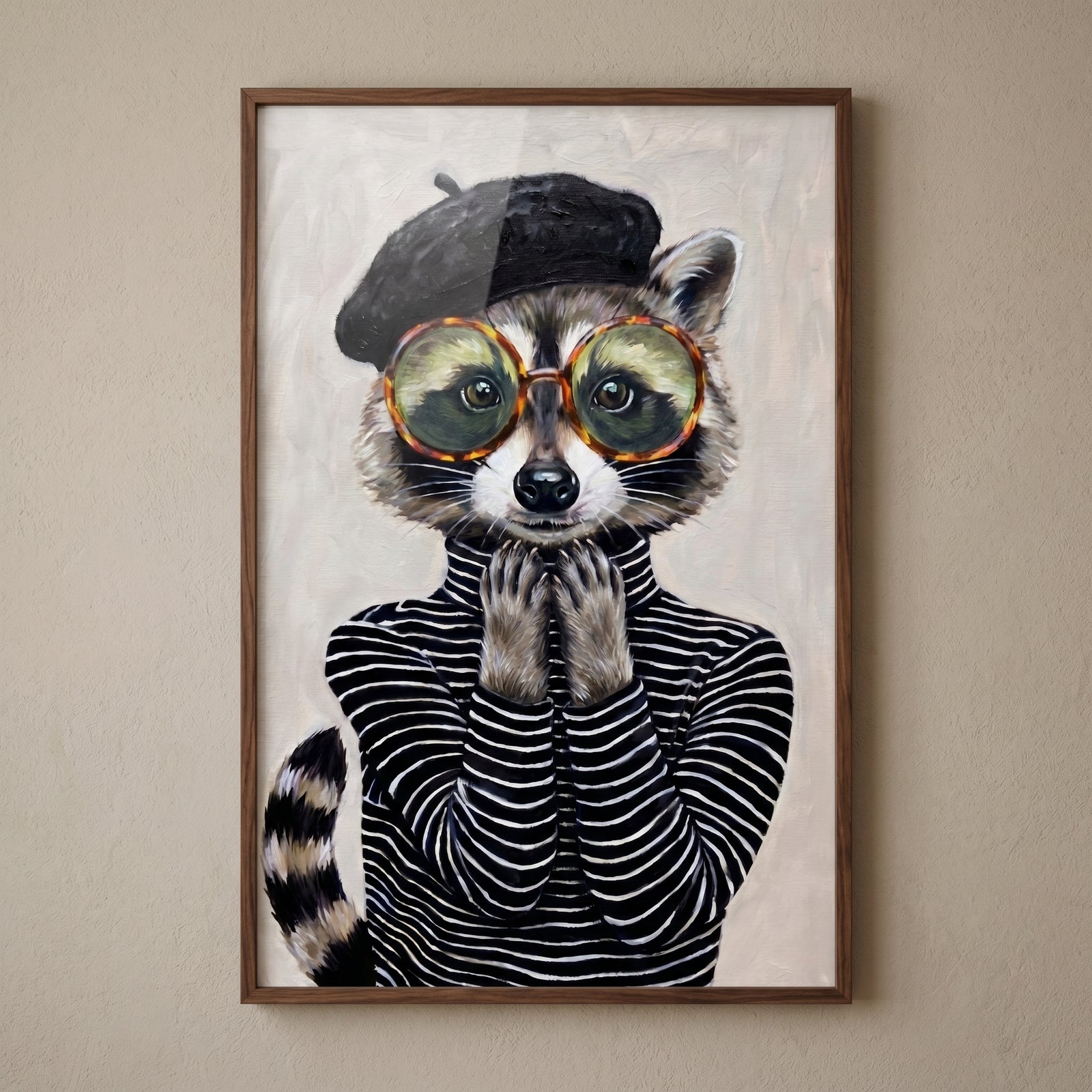 Chic parisian beret raccoon wall art features a raccoon in a striped turtleneck and round glasses with paws under its chin.