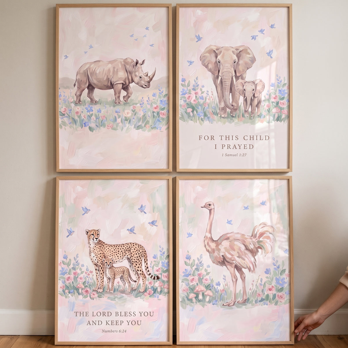 Chic pink savanna animals artwork set of 4 featuring a rhino, elephant, cheetah, and ostrich with biblical verses.