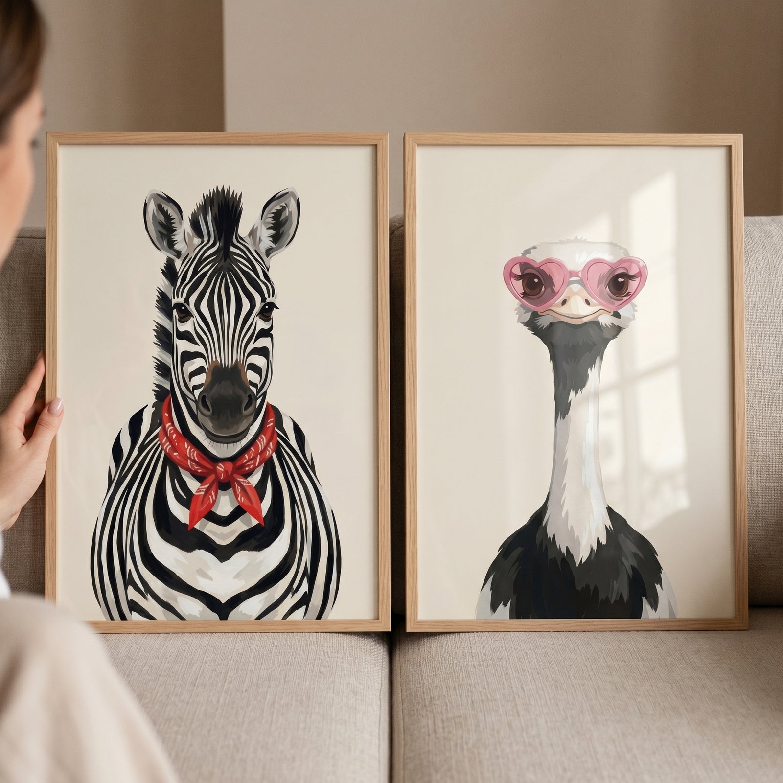 Chic portrait safari animals wall art set of 2: a zebra with a red bandana and an ostrich in pink heart sunglasses.