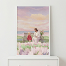 A gentle illustration of Jesus Christ and a young girl sitting together on a simple wooden bench. Jesus, with long brown hair and a white robe, holds a bouquet of wildflowers behind his back. The young girl, in a red dress, looks toward him. They are surrounded by a field of light pink flowers. In the background, a soft-hued sky with purple, pink, and gold tones overlooks distant water and hills. The artwork has a peaceful, watercolor-style aesthetic.