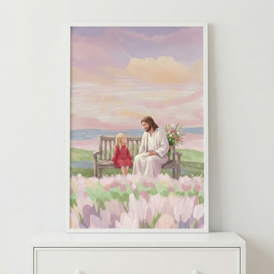 A gentle illustration of Jesus Christ and a young girl sitting together on a simple wooden bench. Jesus, with long brown hair and a white robe, holds a bouquet of wildflowers behind his back. The young girl, in a red dress, looks toward him. They are surrounded by a field of light pink flowers. In the background, a soft-hued sky with purple, pink, and gold tones overlooks distant water and hills. The artwork has a peaceful, watercolor-style aesthetic.