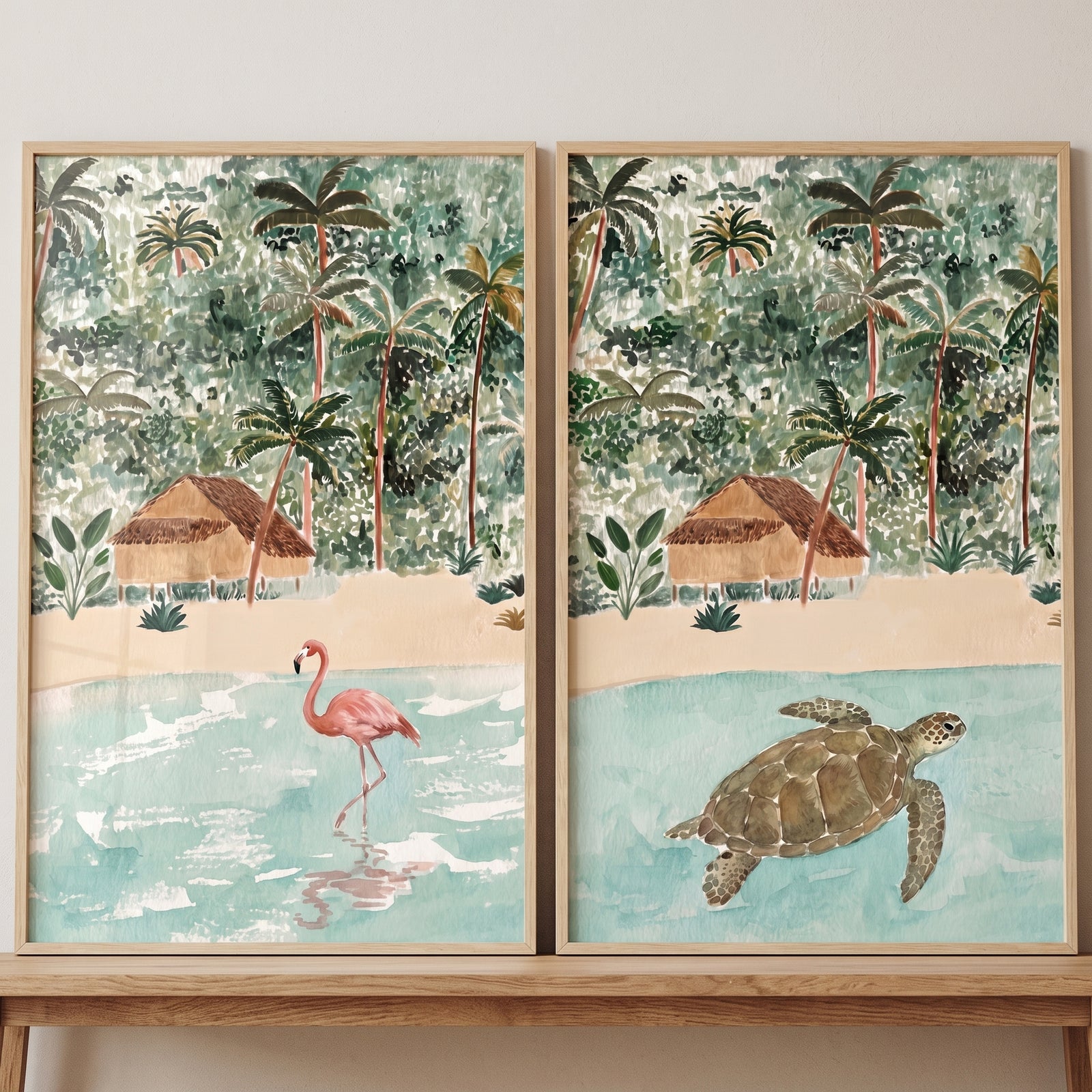 Coastal botanical island landscape animals wall art set of 2 with a pink flamingo, a sea turtle, palms, and beach huts.