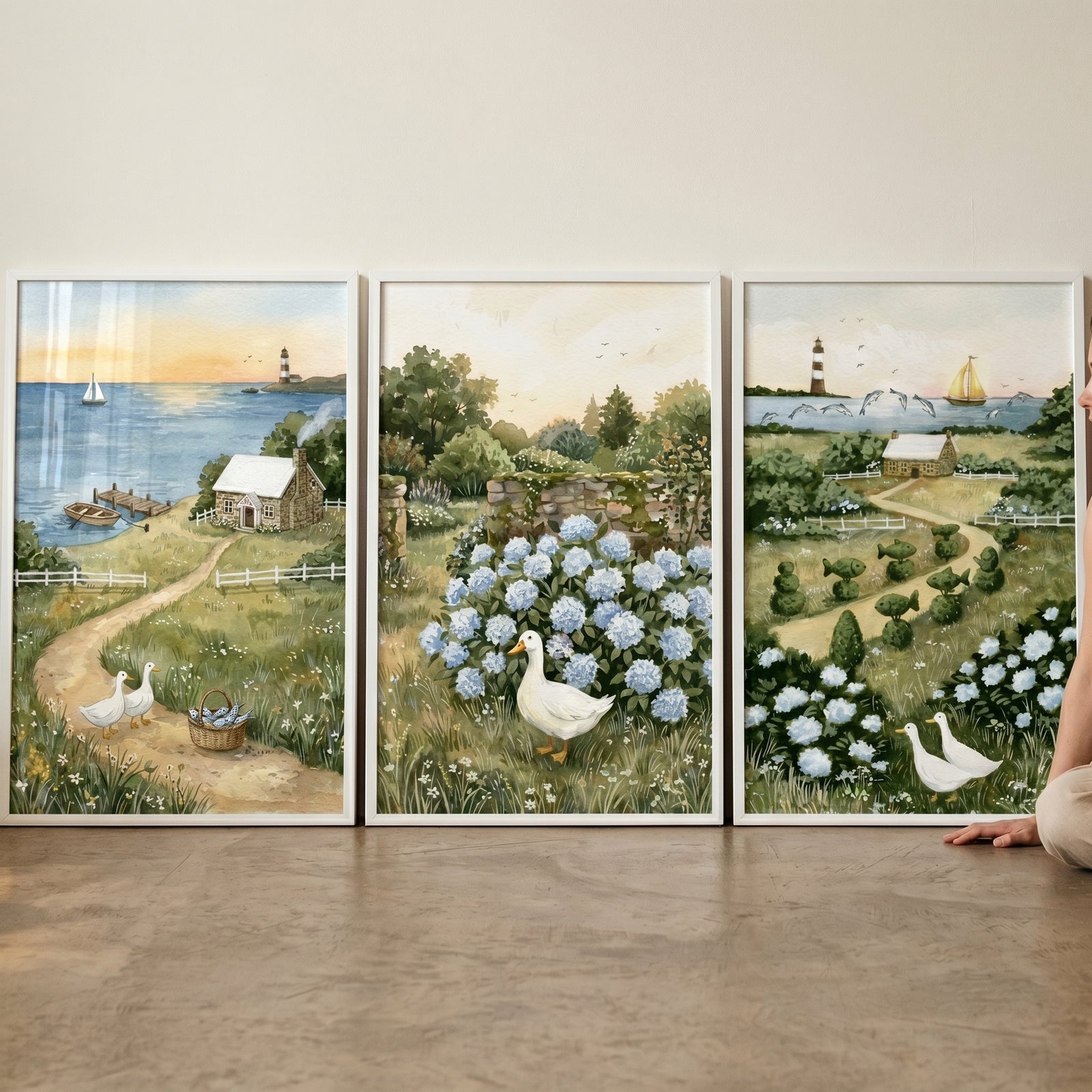 Coastal landscape white duck wall art set of 3 with lighthouses, blue hydrangeas, and cottages.