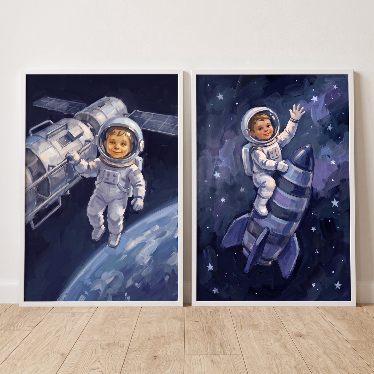 Cobalt starry baby astronaut wall art set of 2 featuring two babies in space suits, a satellite, and a rocket ship.