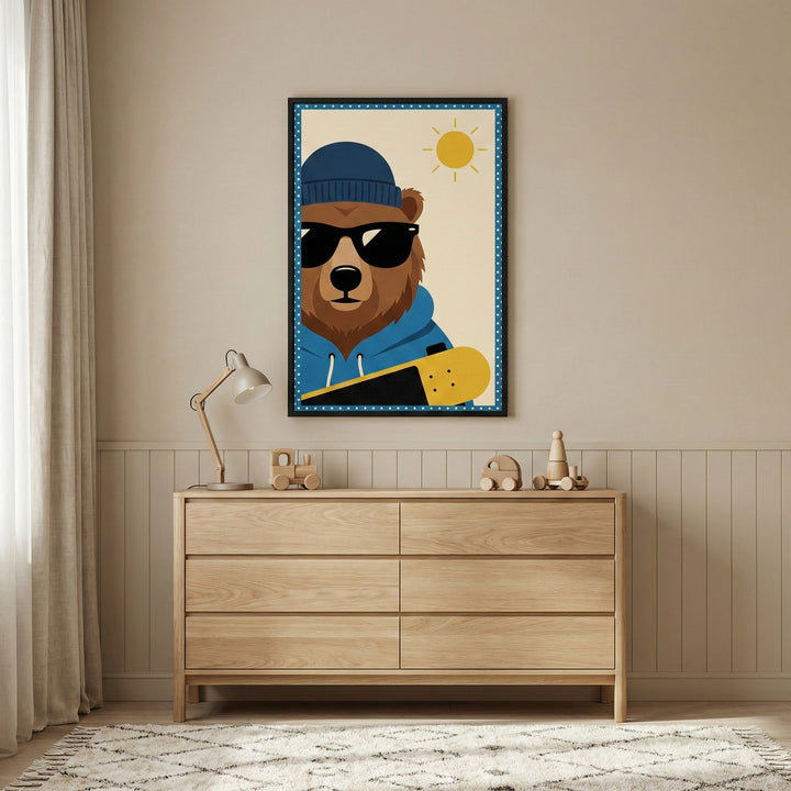 A wooden six-drawer dresser stands against a beige wall in a neutrally decorated room. On the dresser are a small lamp and two wooden toy vehicles. Above the dresser hangs a framed illustration of a brown bear wearing sunglasses, a blue beanie, and a blue hoodie, while holding a yellow skateboard under its arm. The background of the bear art is a light cream color with a small yellow sun and a blue border with white stars. To the left is a long light-colored curtain, and beneath the dresser is a textured wh