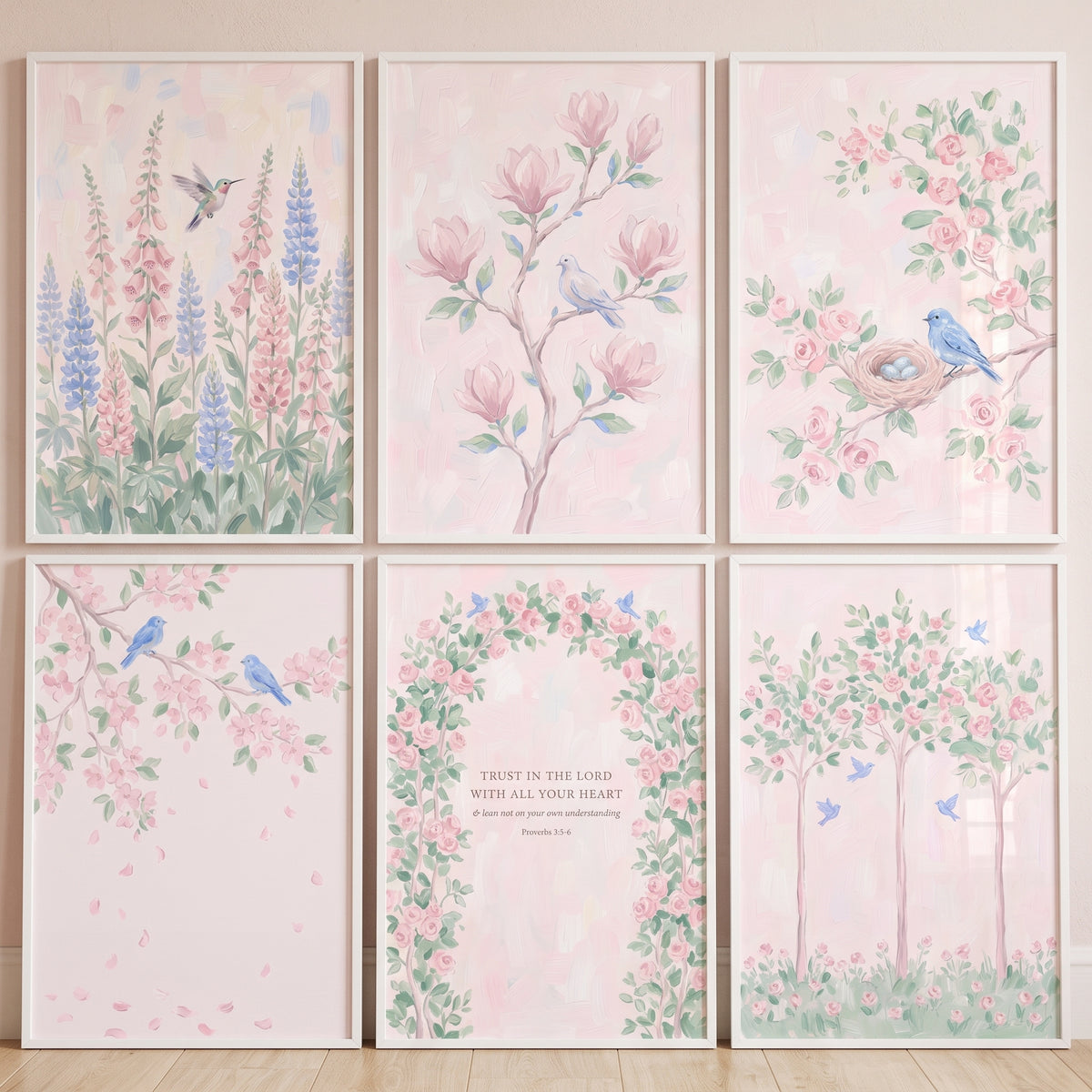 Coquette blush floral garden wall art set of 6 features pink blossoms, birds, and a scripture verse in thin white frames.