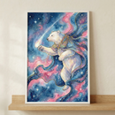 A vertical illustration features a majestic polar bear floating in a cosmic realm. The bear wears an ornate, golden jewel-encrusted collar and is draped in a flowing cape made of swirling blue and pink celestial energy. It reaches a paw toward a bright, trailing comet. The background is a deep blue sky filled with twinkling stars and vibrant pink and blue nebula clouds. This whimsical piece is held in a thin white frame and sits on a light wooden shelf against a neutral wall.
