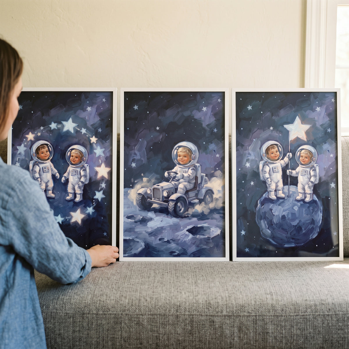Cosmic voyage baby astronaut wall art set of 3 displays infants in space suits exploring the moon and stars.