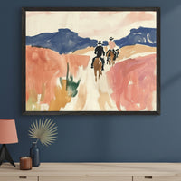 Modern living room with a light wood dresser. A large framed abstract watercolor painting hangs centered above the dresser, depicting three cowboys on horseback in a desert landscape with mountains, rendered in blue, orange, and cream.
