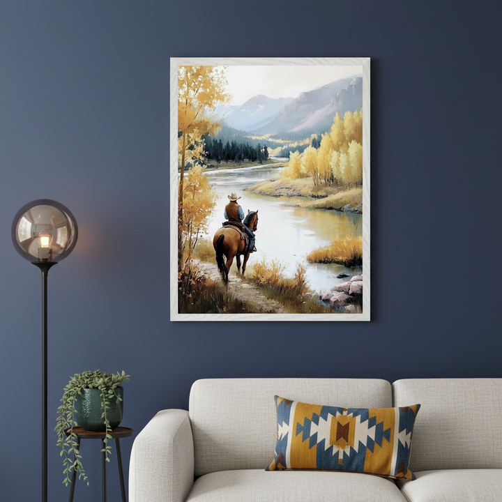 Modern living room with a light sofa and floor lamp. A framed painting of a person riding a horse along a river with yellow trees and mountains in an impressionistic style hangs above the sofa.