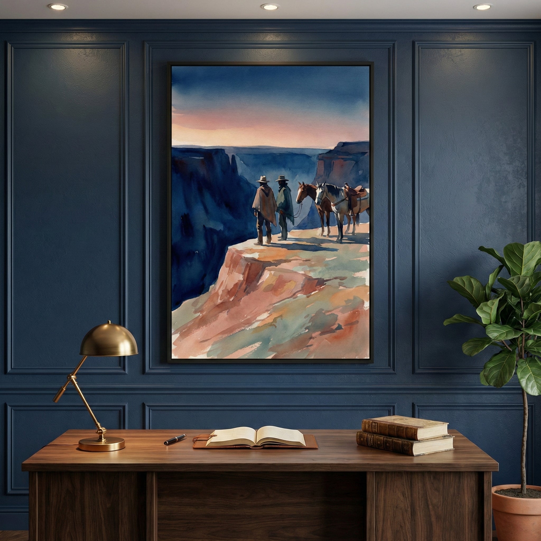 Framed western cowboy artwork featuring a horse and rider between dramatic canyon walls, displayed above a modern neutral-toned sofa with blue and rust accent pillows.