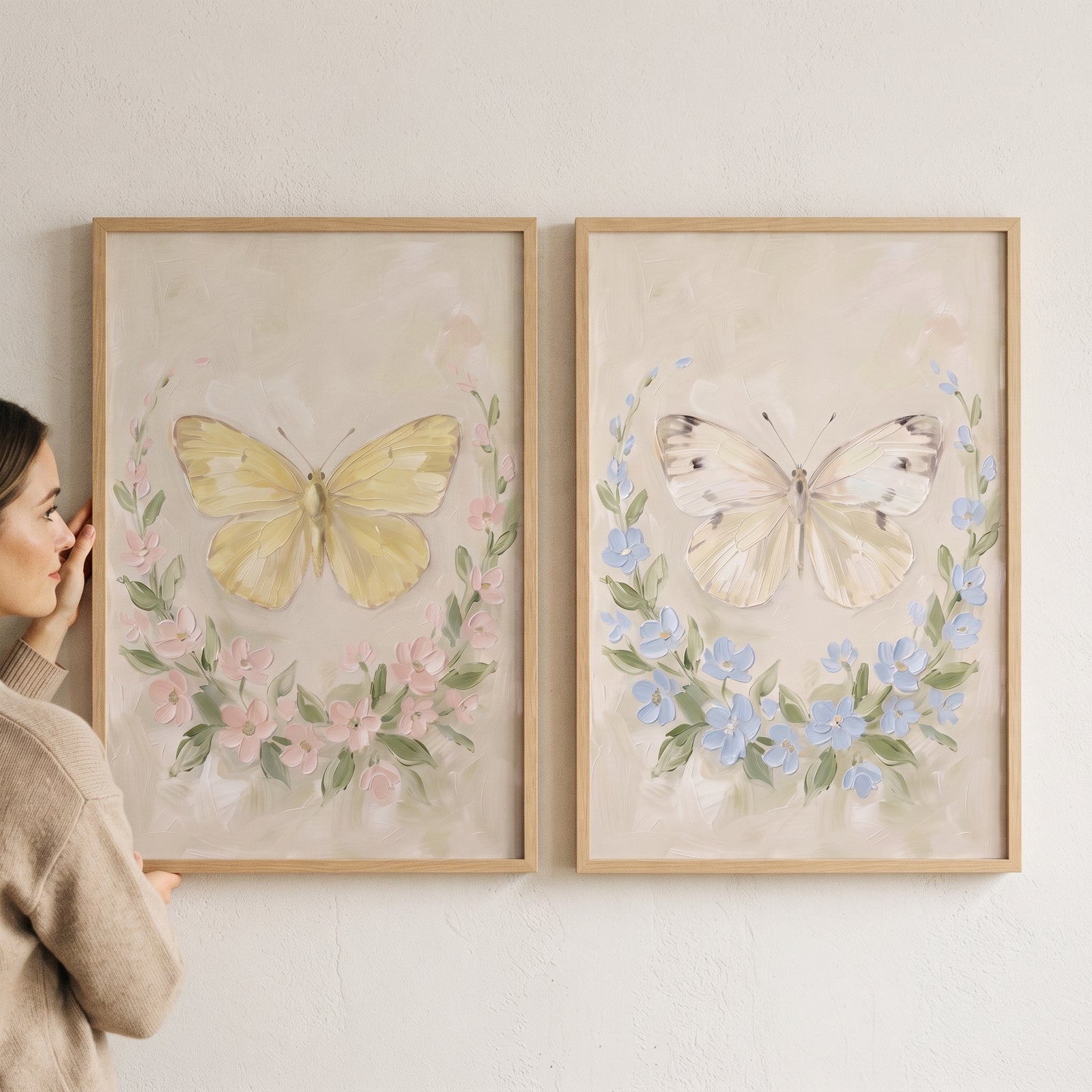 Creamy textured botanical butterfly wall art set of 2 featuring soft yellow and white butterflies in wooden frames.
