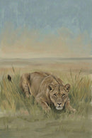 A lioness lies low in tall grass, her body poised and eyes fixed forward in an alert, focused gaze. The background features a vast, muted savanna under a soft blue sky.
