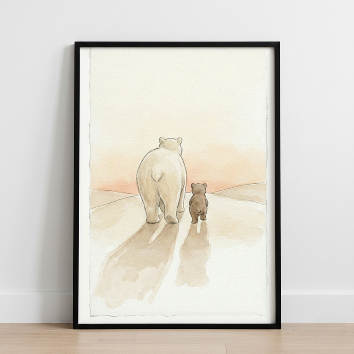 A vertical illustration of a large white bear and a small brown cub walking side-by-side away from the viewer. They traverse a pale landscape under a soft peach-colored sky at sunset or sunrise. Long, light-brown shadows stretch from their feet toward the bottom of the frame. The artwork, which has a soft watercolor aesthetic and deckled edges, is showcased within a thin black frame hanging on a white wall.