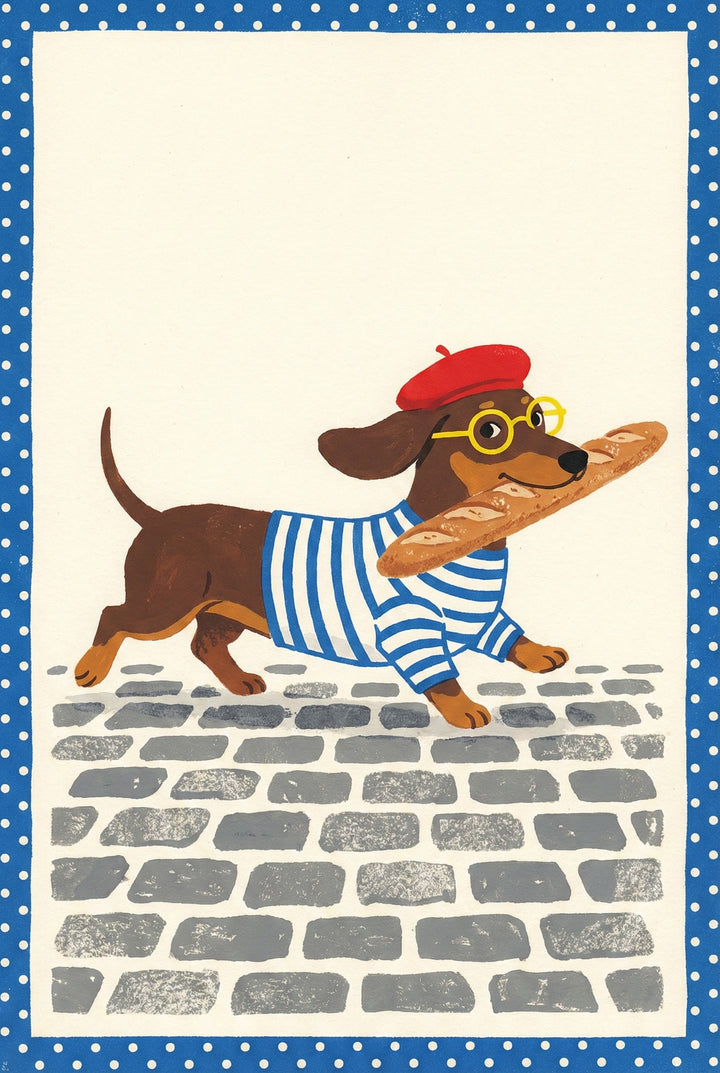 A whimsical illustration of a brown and tan dachshund walking across a grey cobblestone street. The dog is dressed in a blue and white striped shirt, round yellow glasses, and a small red beret, while carrying a long baguette in its mouth. The scene is set against a plain cream background and is framed by a blue border with white polka dots.