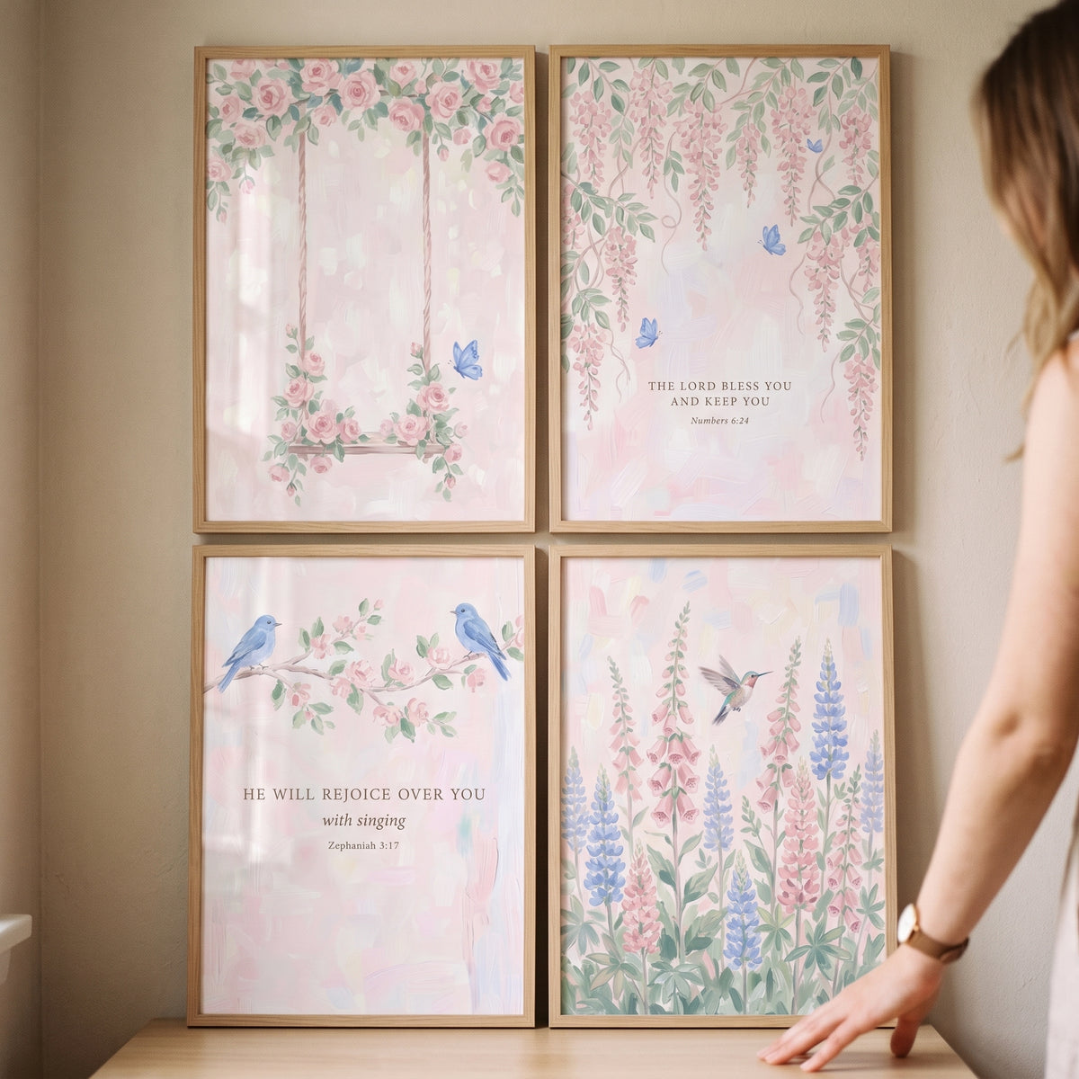 Dainty blush pink garden wall art set of 4 featuring birds, flowers, and scripture verses in light wood frames.
