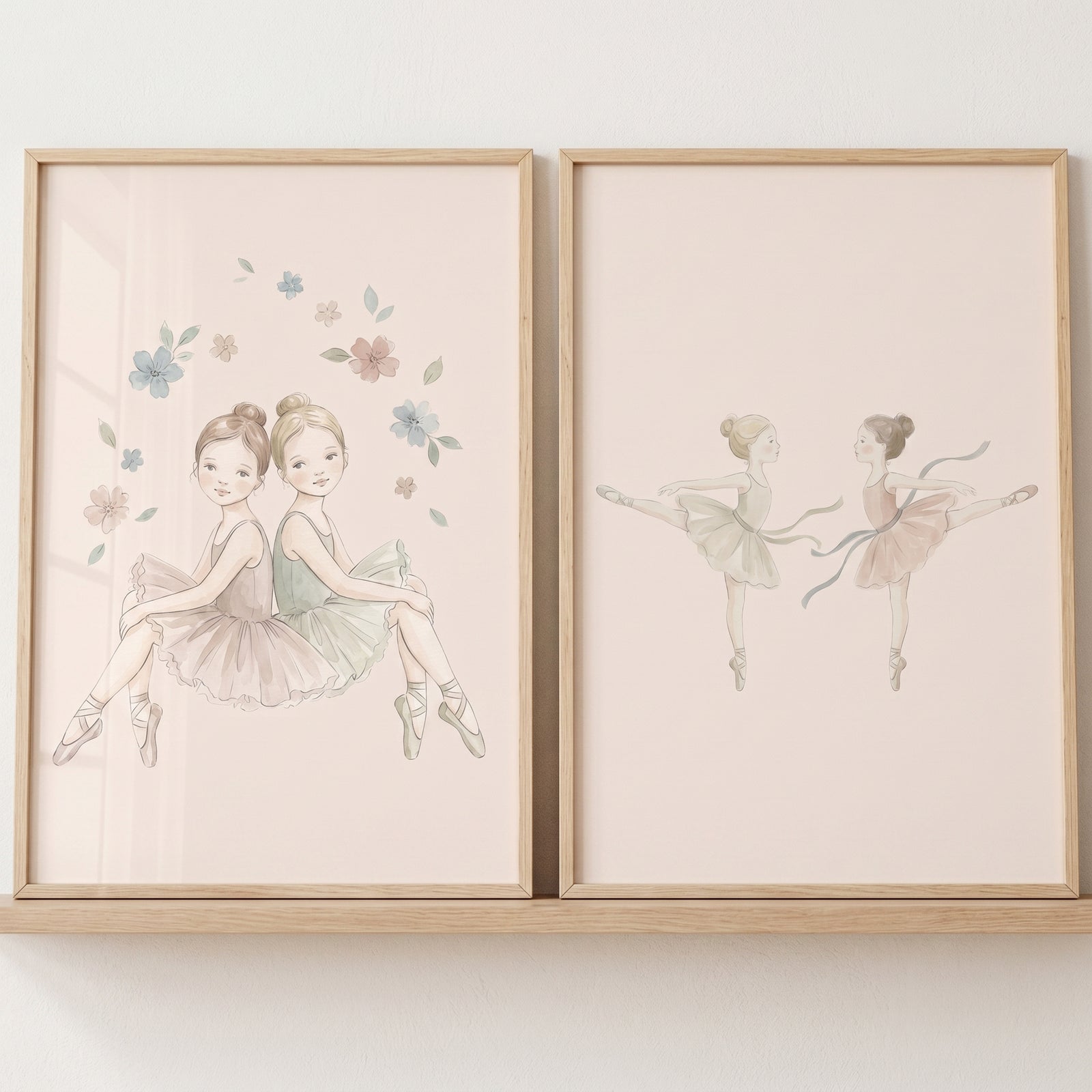 Dainty hair bun ballerina print set of 2. Watercolor illustrations show young dancers in tutus in thin wooden frames.