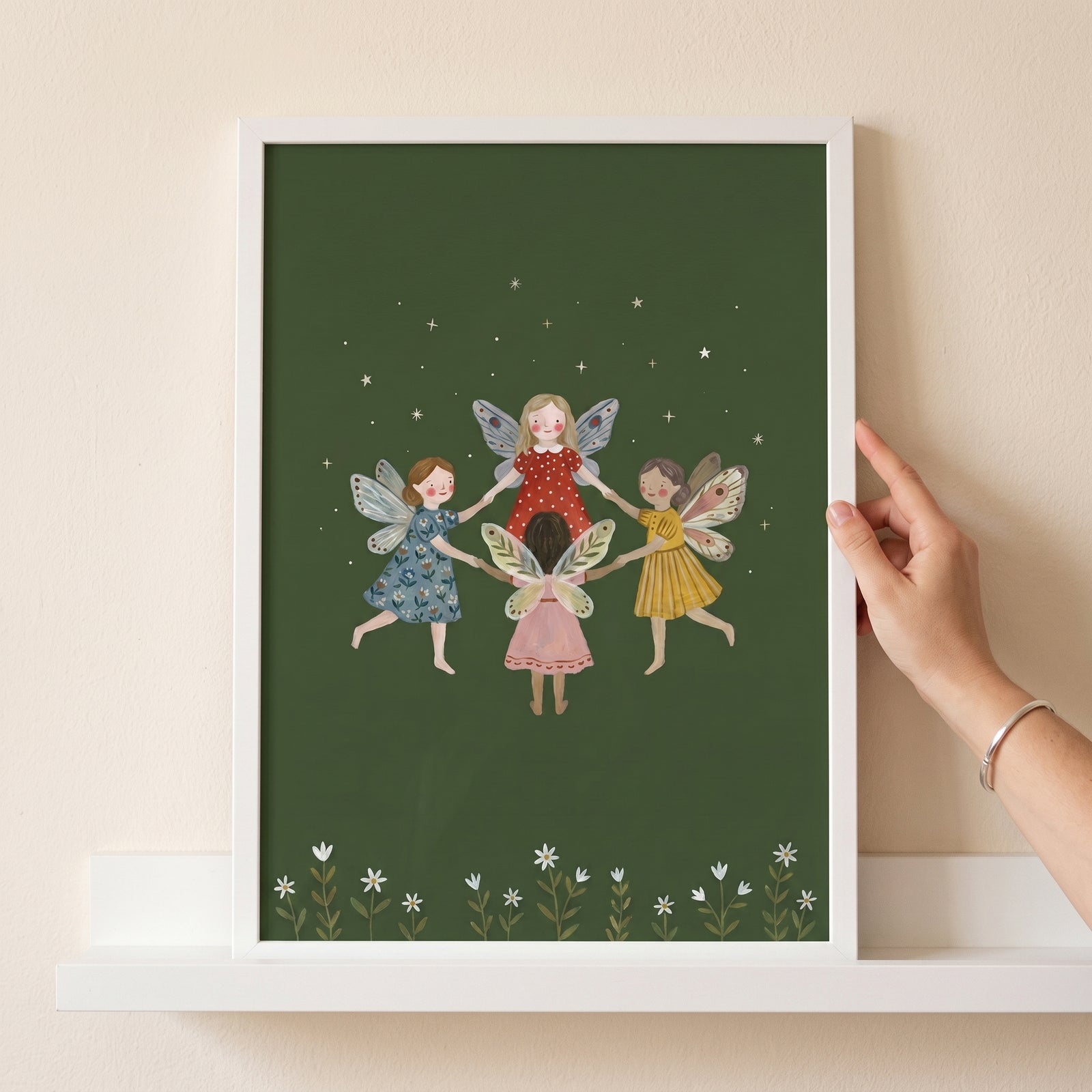 Four winged girls holding hands in this framed dancing circle forest fairies wall art under stars and above white flowers.
