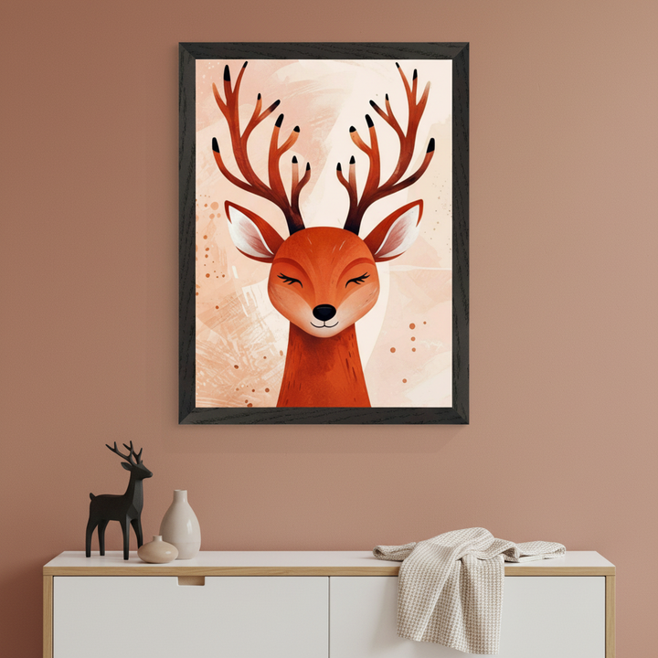 Modern room with a white and wood credenza. Above it, a large framed illustration of a smiling deer with prominent antlers hangs on a terracotta wall. A black deer figurine, vases, and a draped blanket adorn the credenza.