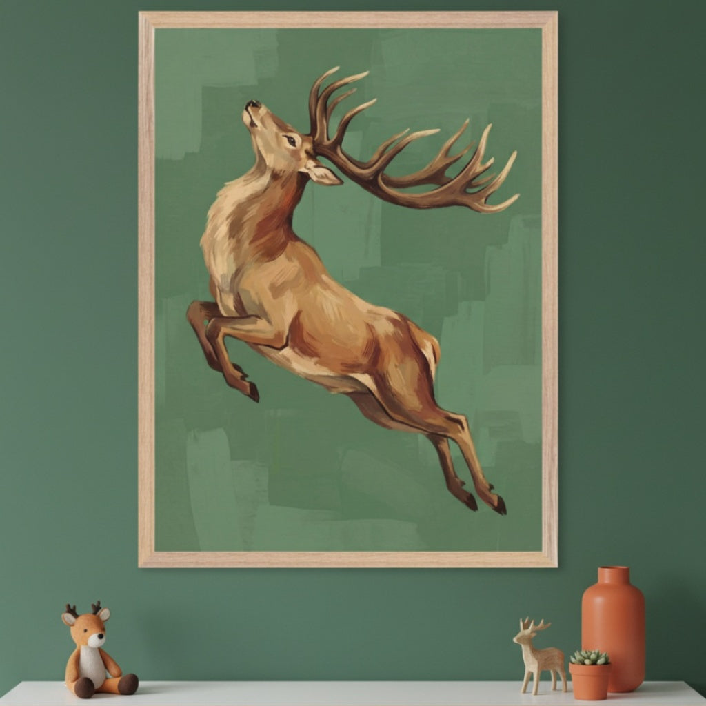 Modern room with a large framed painting of a leaping stag with antlers hanging centered above a white console table. The artwork is in a painterly style on a green background. A plush deer toy, wooden deer figurine, orange vase, and small plant are on the table.