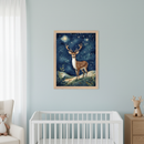 Modern nursery with light blue walls. A white crib is in the foreground, a white armchair to the left, and a wooden dresser to the right. A framed watercolor painting of a spotted deer under a starry night sky hangs above the crib on the right.