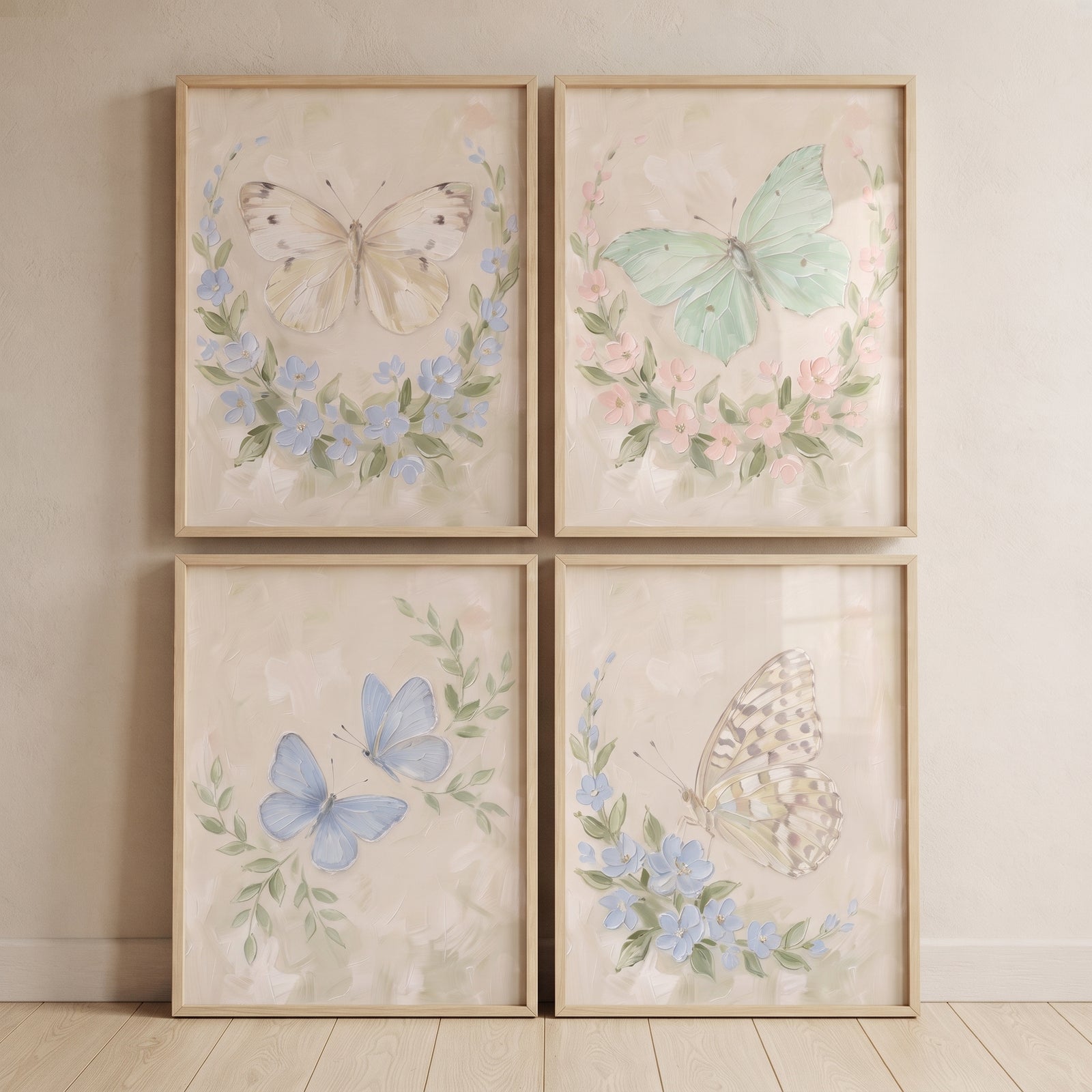 Delicate palette floral butterfly wall art set of 4 featuring soft-hued insects and blooming wreaths in wood frames.